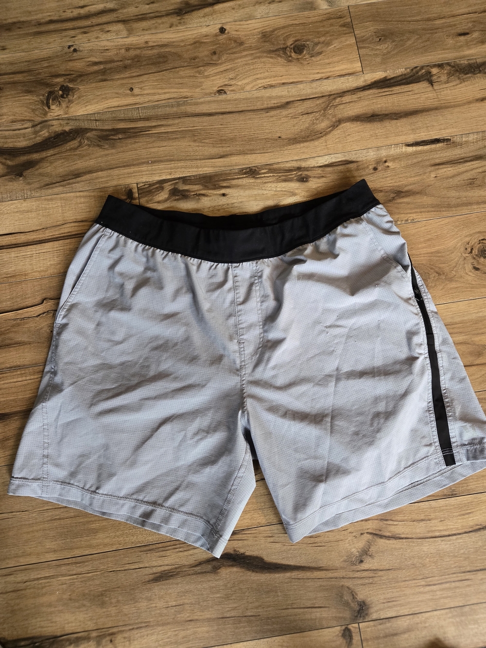 Light Gray Athletic Shorts with Black Waistband Vuori